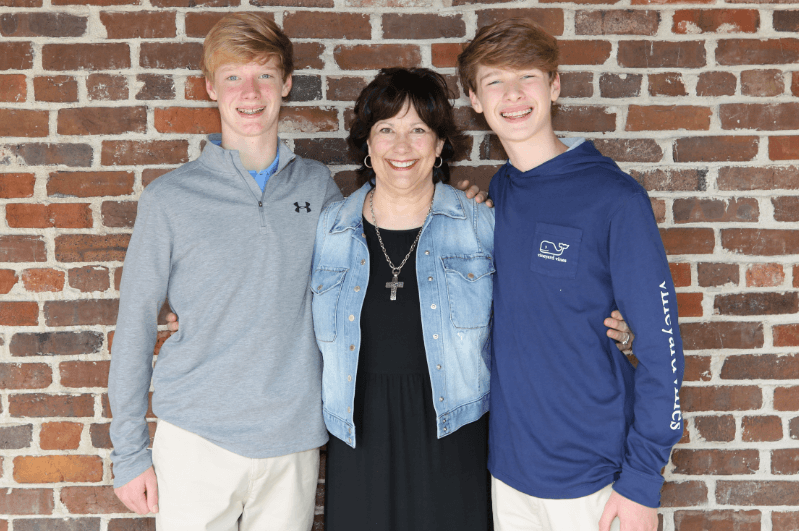 Orthodontist, Dr. Mary Cay Koen with two teen boy patients